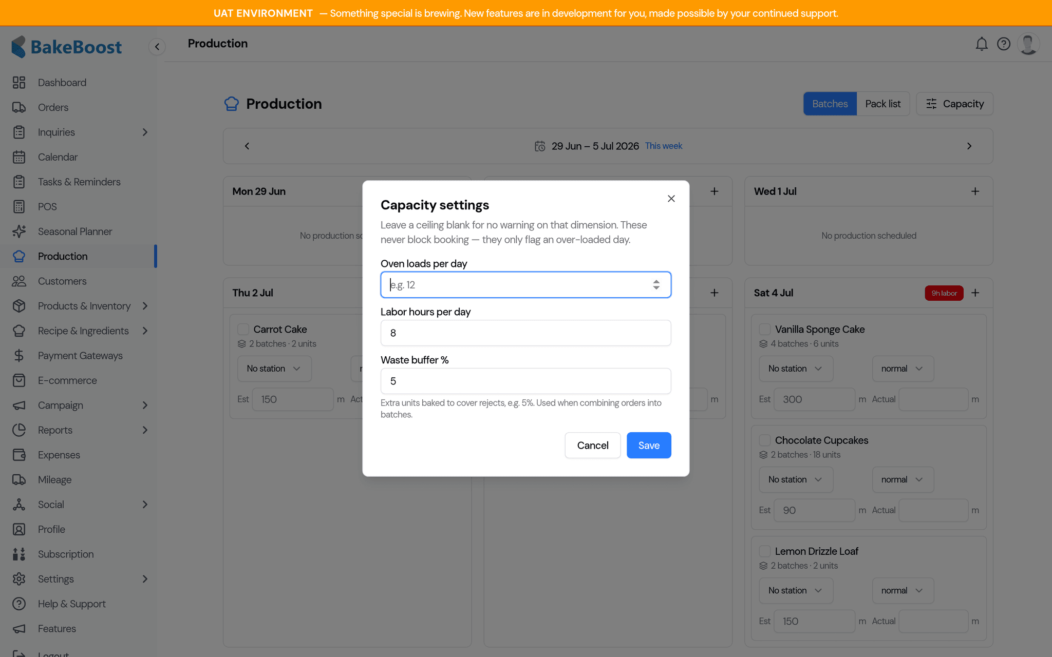 The Capacity settings dialog with fields for labor hours per day, oven loads per day and the waste buffer percentage